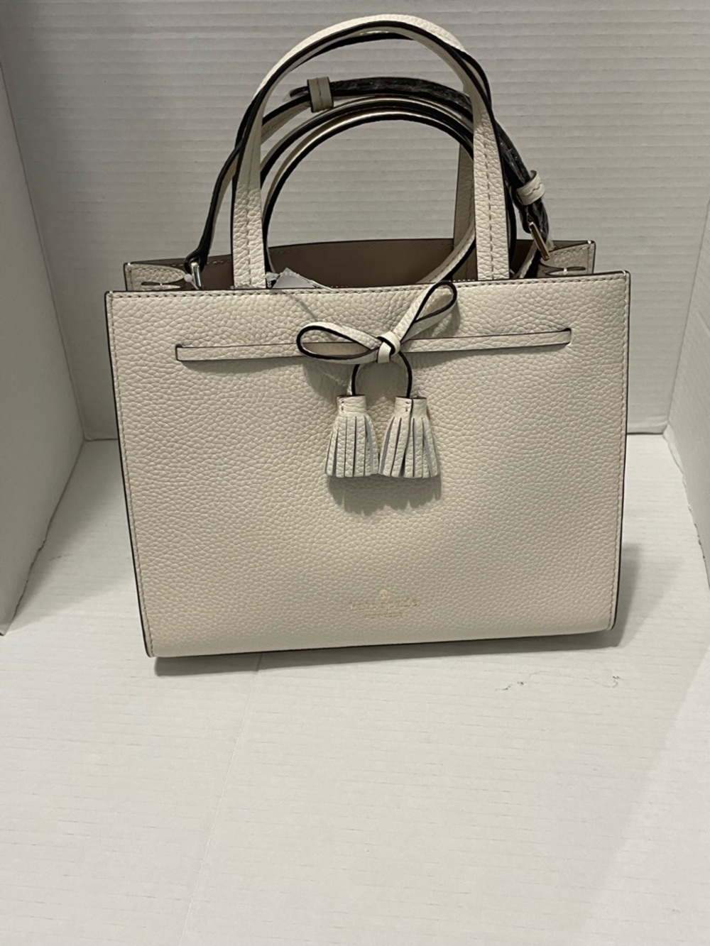kate spade Cream Pebbled Leather Satchel with Tassel Detail